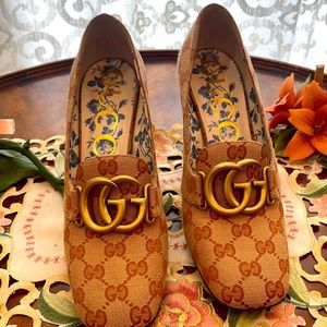 Beautiful Gucci monogram stacked heels with gold Iconic hardware.